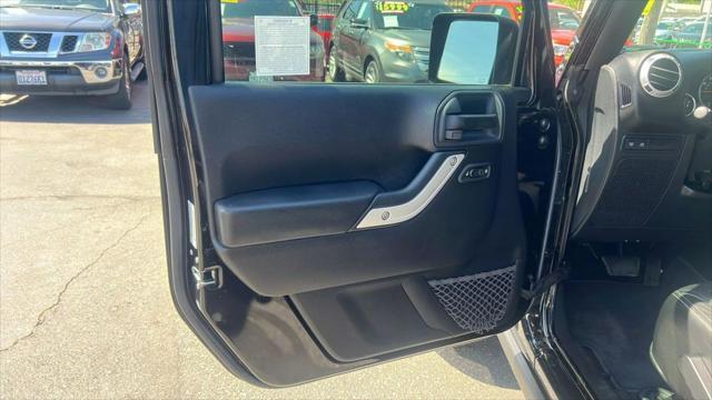 used 2015 Jeep Wrangler Unlimited car, priced at $19,995