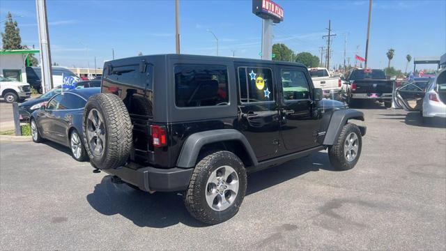 used 2015 Jeep Wrangler Unlimited car, priced at $19,995
