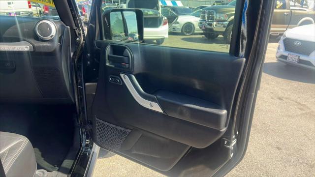 used 2015 Jeep Wrangler Unlimited car, priced at $19,995
