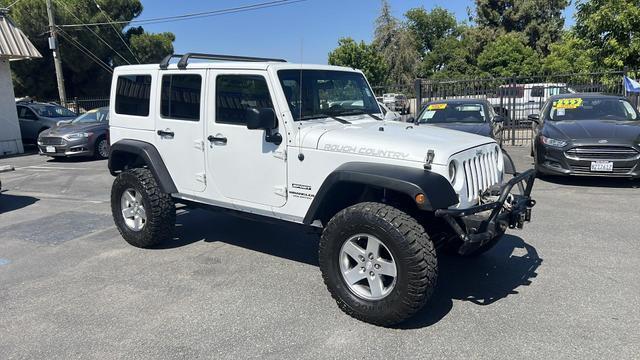 used 2012 Jeep Wrangler Unlimited car, priced at $18,995