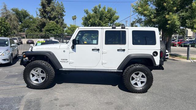 used 2012 Jeep Wrangler Unlimited car, priced at $18,995