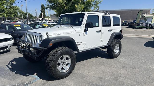 used 2012 Jeep Wrangler Unlimited car, priced at $18,995