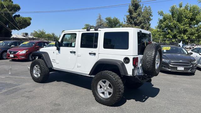 used 2012 Jeep Wrangler Unlimited car, priced at $18,995