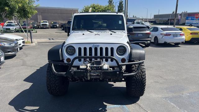 used 2012 Jeep Wrangler Unlimited car, priced at $18,995