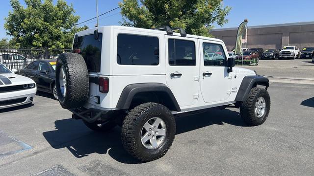 used 2012 Jeep Wrangler Unlimited car, priced at $18,995