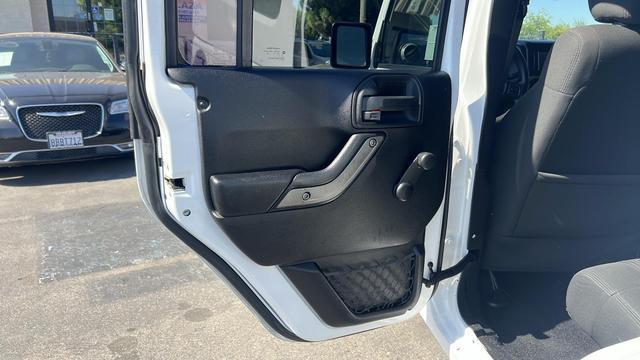 used 2012 Jeep Wrangler Unlimited car, priced at $18,995