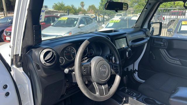 used 2012 Jeep Wrangler Unlimited car, priced at $18,995