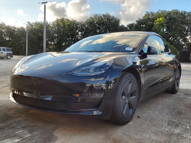 used 2023 Tesla Model 3 car, priced at $26,551