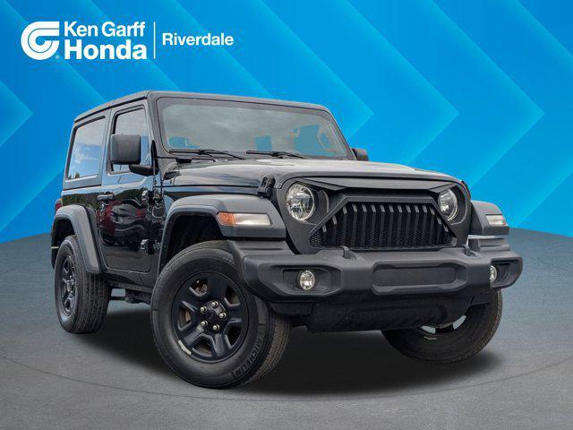 used 2023 Jeep Wrangler car, priced at $27,869