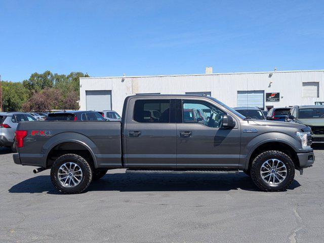 used 2018 Ford F-150 car, priced at $27,519