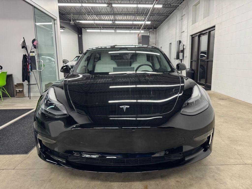 used 2022 Tesla Model 3 car, priced at $28,870
