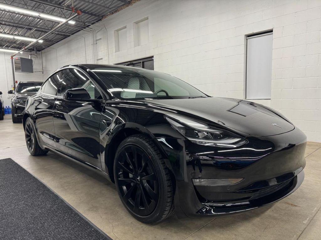 used 2022 Tesla Model 3 car, priced at $28,870