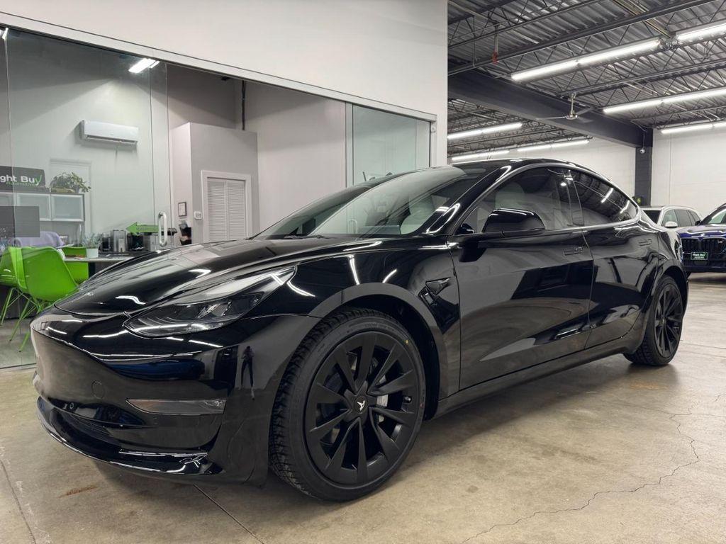 used 2022 Tesla Model 3 car, priced at $28,870