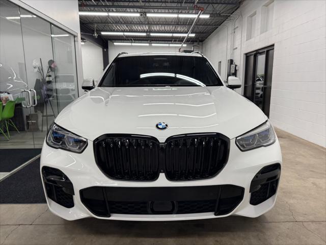 used 2023 BMW X5 car, priced at $67,784