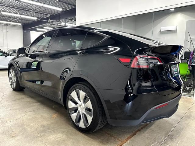 used 2023 Tesla Model Y car, priced at $32,921