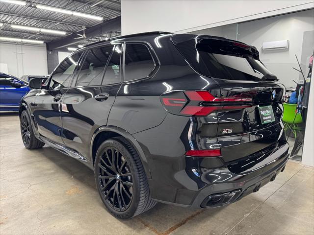 used 2024 BMW X5 car, priced at $79,907