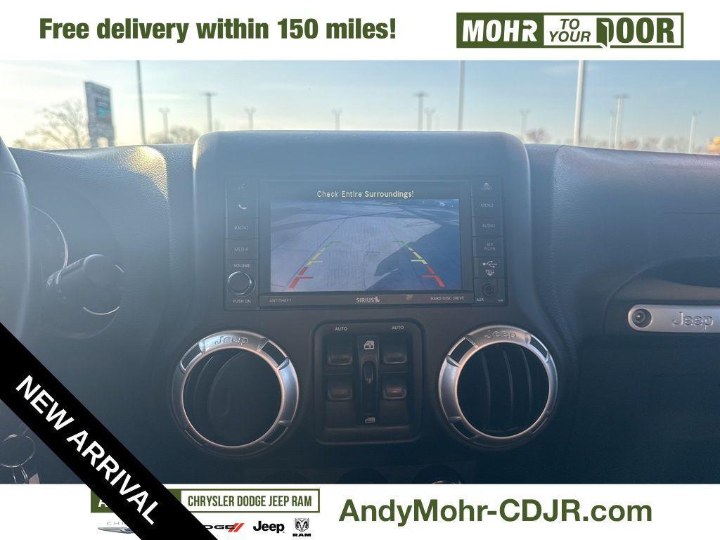 used 2015 Jeep Wrangler Unlimited car, priced at $15,974