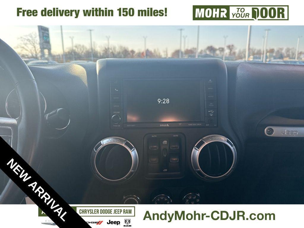 used 2015 Jeep Wrangler Unlimited car, priced at $15,974