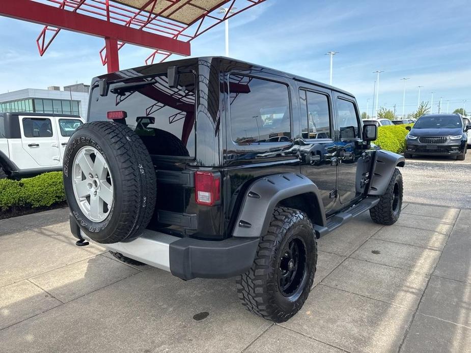 used 2012 Jeep Wrangler Unlimited car, priced at $16,809