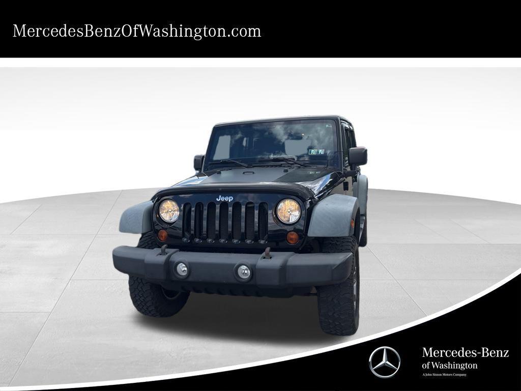 used 2011 Jeep Wrangler Unlimited car, priced at $15,995