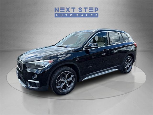 used 2018 BMW X1 car, priced at $13,888