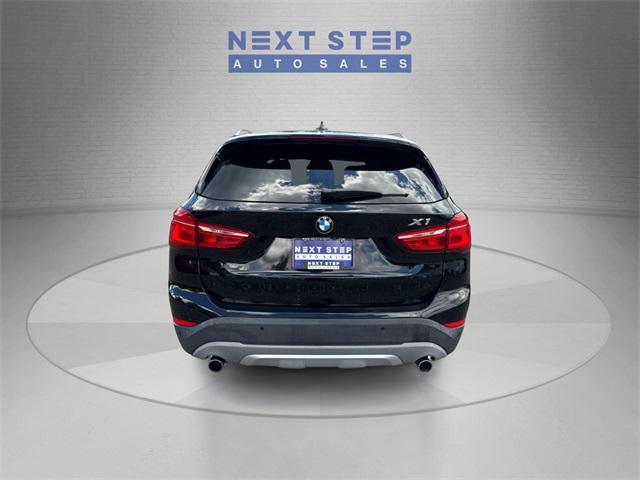 used 2018 BMW X1 car, priced at $13,888