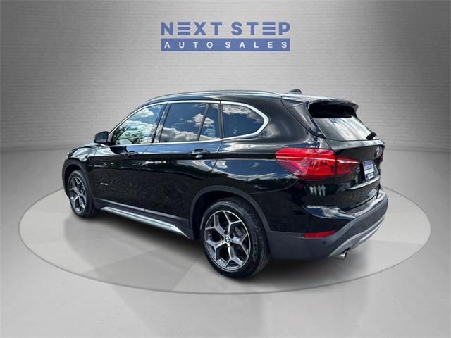 used 2018 BMW X1 car, priced at $13,888