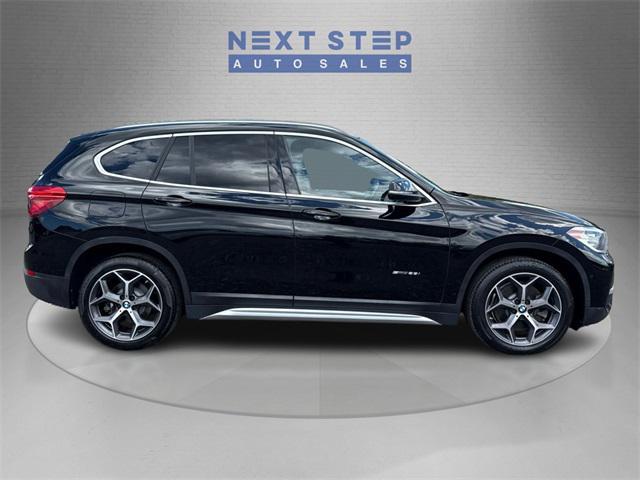 used 2018 BMW X1 car, priced at $13,888