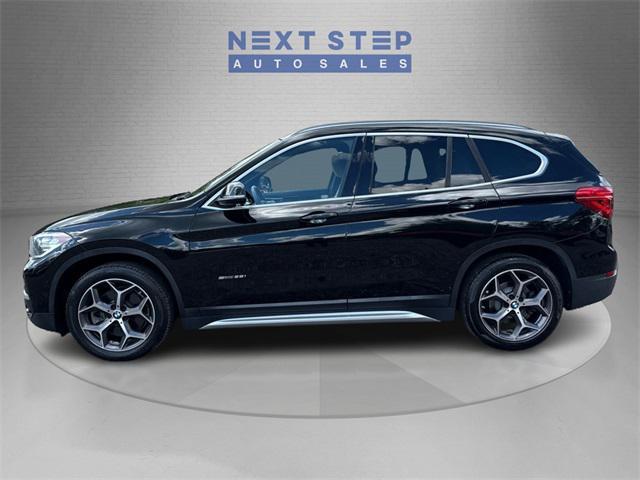 used 2018 BMW X1 car, priced at $13,888
