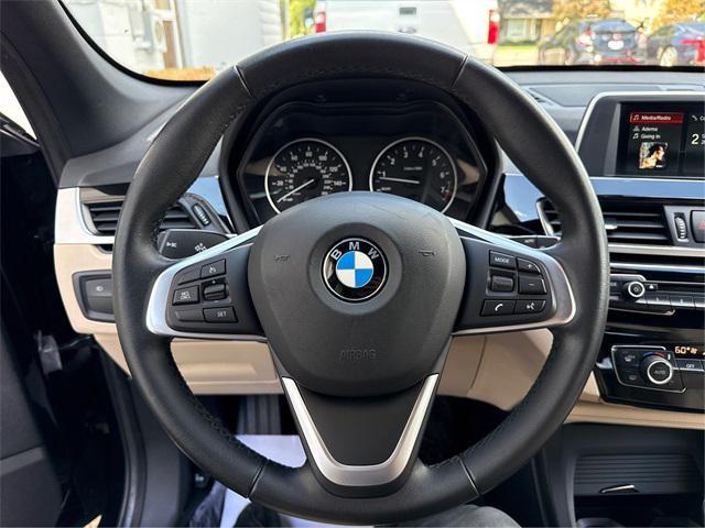 used 2018 BMW X1 car, priced at $13,888