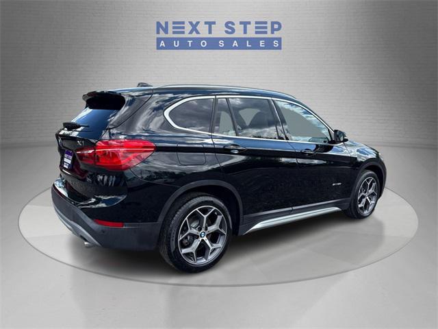 used 2018 BMW X1 car, priced at $13,888