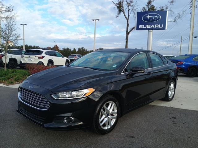 used 2014 Ford Fusion car, priced at $10,182