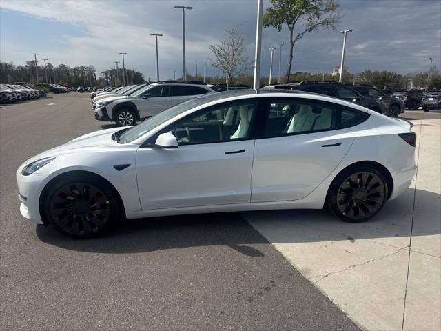 used 2023 Tesla Model 3 car, priced at $34,972