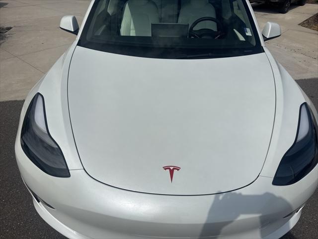 used 2023 Tesla Model 3 car, priced at $34,972