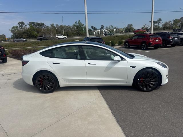 used 2023 Tesla Model 3 car, priced at $34,972