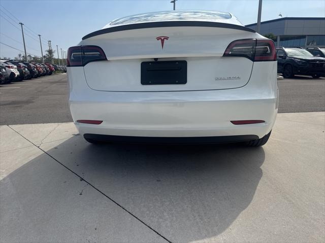 used 2023 Tesla Model 3 car, priced at $34,972