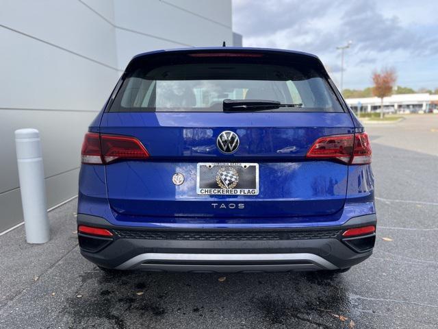used 2024 Volkswagen Taos car, priced at $21,197