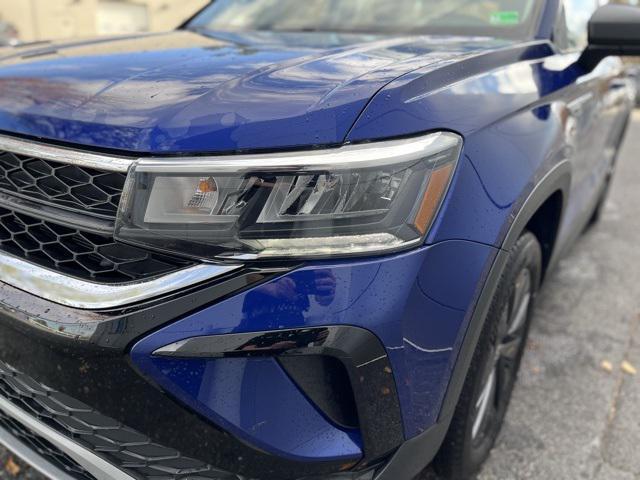 used 2024 Volkswagen Taos car, priced at $21,197