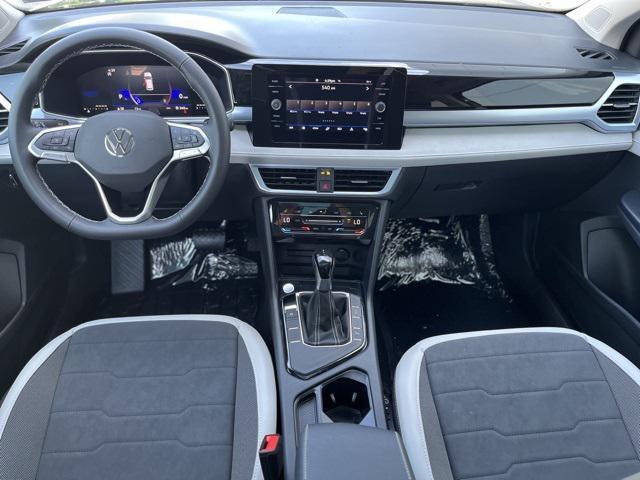 new 2025 Volkswagen Taos car, priced at $29,433