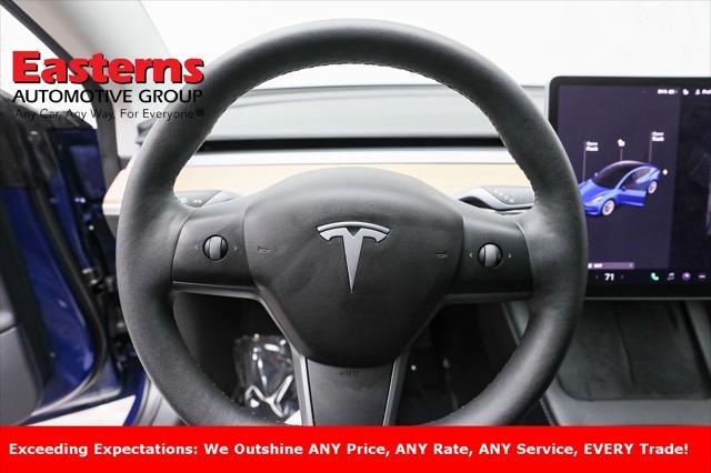 used 2022 Tesla Model 3 car, priced at $26,750