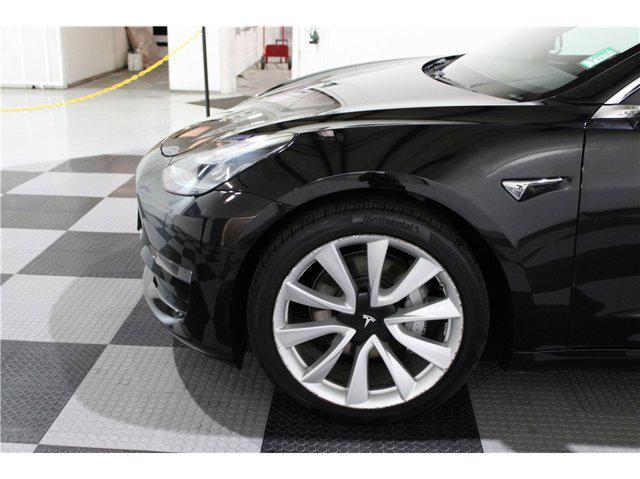 used 2018 Tesla Model 3 car, priced at $20,799