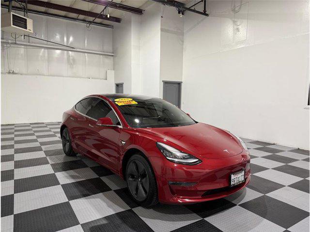 used 2018 Tesla Model 3 car, priced at $27,999