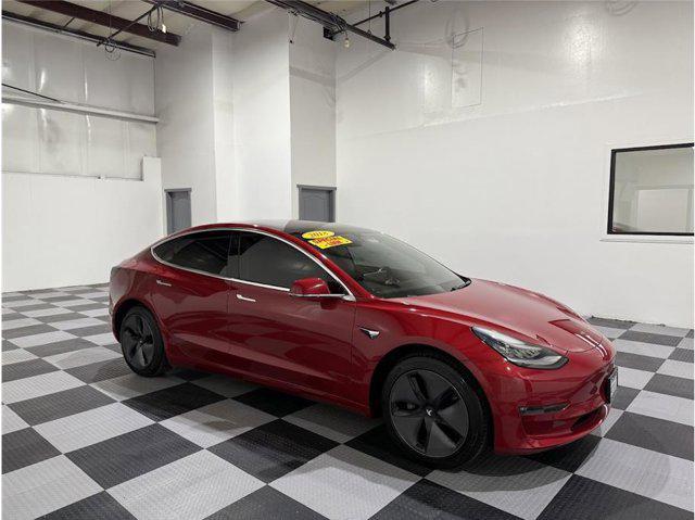 used 2018 Tesla Model 3 car, priced at $27,999