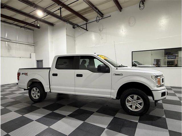 used 2018 Ford F-150 car, priced at $22,199