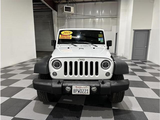 used 2018 Jeep Wrangler JK car, priced at $23,998