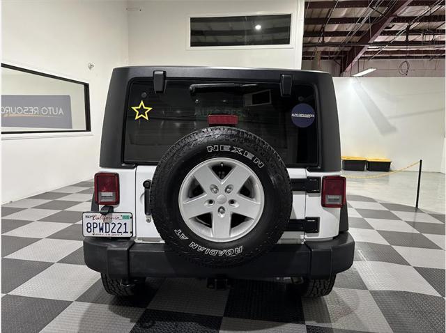 used 2018 Jeep Wrangler JK car, priced at $23,998