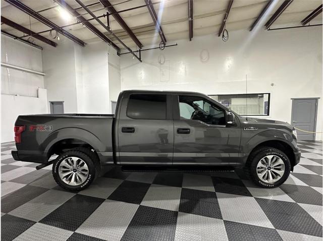 used 2018 Ford F-150 car, priced at $26,445