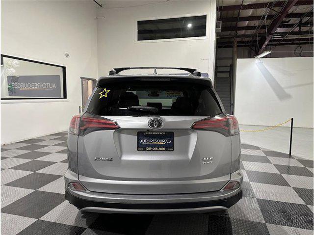 used 2018 Toyota RAV4 car, priced at $19,199