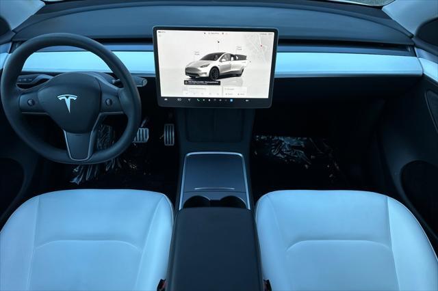 used 2023 Tesla Model Y car, priced at $38,995