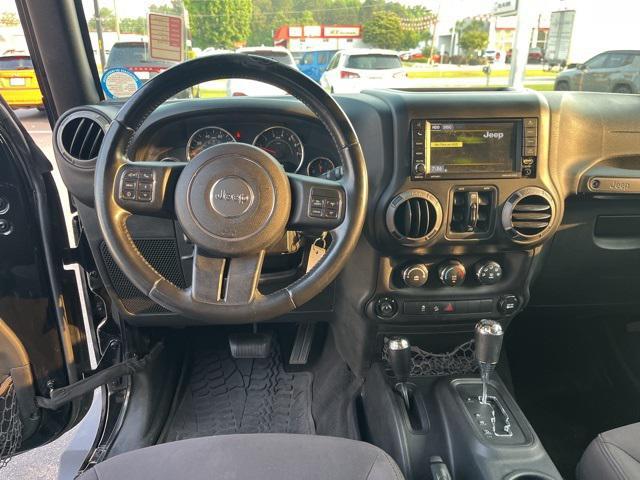 used 2015 Jeep Wrangler Unlimited car, priced at $16,299